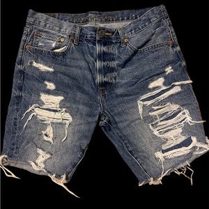 American Eagle Cut-Off Jean Shorts
Men's Size 34 Blue Destroyed